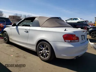 2009 BMW 1 Series 128i with VIN WBAUN13589VH81608, listed as a Copart auction lot 47283005 with 65,158 mi miles and Salvage Title. Bid and sale history available at carsss.com. Image 2.