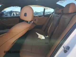 2020 BMW 5 Series 530i z VIN WBAJR3C01LWW68055, wystawiony jako Copart lot #56959985 z przebiegiem Nie podano mil oraz Nie do naprawy • Non repairable. Historia ofert i sprzedaży dostępna na DreamBid. Obrazek 10.