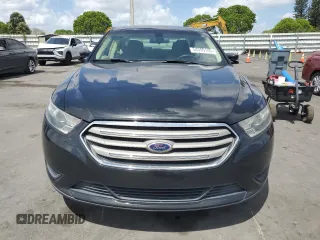 2015 Ford Taurus SE with VIN 1FAHP2D86FG140750, listed as a Copart auction lot 54390145 with 128,163 mi miles and Salvage Title. Bid and sale history available at carsss.com. Image 5.