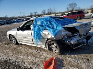 2004 Pontiac Grand Am GT with VIN 1G2NW52E74C248412, listed as a Copart auction lot 87003124 with 0 mi miles and Salvage Title. Bid and sale history available at carsss.com. Image 2.