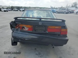 1991 Honda Accord LX z VIN JHMCB7659MC039465, wystawiony jako Copart lot #55810155 z przebiegiem 206 192 mil mil oraz Szkoda całkowita • Salvage title. Historia ofert i sprzedaży dostępna na DreamBid. Obrazek 6.