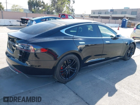 2014 Tesla Model S P85D with VIN 5YJSA1H22EFP65530, listed as a IAAI auction lot 41959941 with 76,532 mi miles and . Bid and sale history available at DreamBid. Image 4.