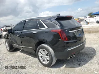 2021 Cadillac XT5 FWD Luxury with VIN 1GYKNAR46MZ127028, listed as a Copart auction lot 47555235 with 48,364 mi miles and Salvage Title. Bid and sale history available at carsss.com. Image 2.