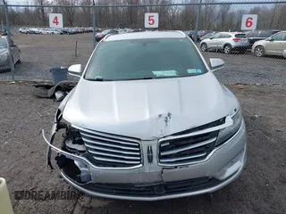 2015 Lincoln MKC with VIN 5LMTJ2AH6FUJ10863, listed as a IAAI auction lot 41983116 with 111,250 mi miles. Bid and sale history available at carsss.com. Image 13.