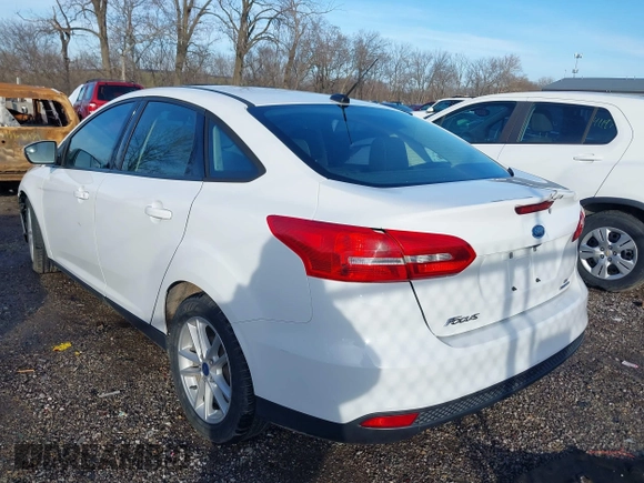 2016 Ford Focus SE with VIN 1FADP3F28GL348103, listed as a IAAI auction lot 41185718 with 69,256 mi miles. Bid and sale history available at carsss.com. Image 3.