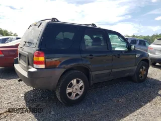 2003 Ford Escape XLT Popular 2 with VIN 1FMYU93133KB35168, listed as a Copart auction lot 57303335 with 197,368 mi miles and Salvage title. Bid and sale history available at DreamBid. Image 3.