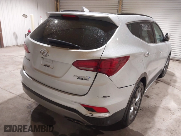 2018 Hyundai Santa Fe Ultimate with VIN 5XYZWDLA9JG502177, listed as a IAAI auction lot 41904033 with 68,000 mi miles and . Bid and sale history available at DreamBid. Image 4.