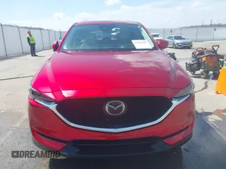 2018 Mazda CX-5 Grand Touring with VIN JM3KFBDM6J0424663, listed as a IAAI auction lot 42003207 with 95,442 mi miles and . Bid and sale history available at DreamBid. Image 12.