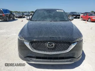 2024 Mazda CX-5 2.5 Turbo Signature with VIN JM3KFBXY2R0354346, listed as a Copart auction lot 49260525 with 9,571 mi miles and Salvage Title. Bid and sale history available at carsss.com. Image 5.