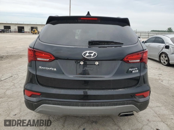 2018 Hyundai Santa Fe 2.4L с VIN 5XYZUDLB4JG564066, выставлен на аукционе Copart как лот 61033905 с пробегом 85 805 миль миль и Списание • Salvage title. История ставок и продаж доступна на DreamBid. Изображение 6.