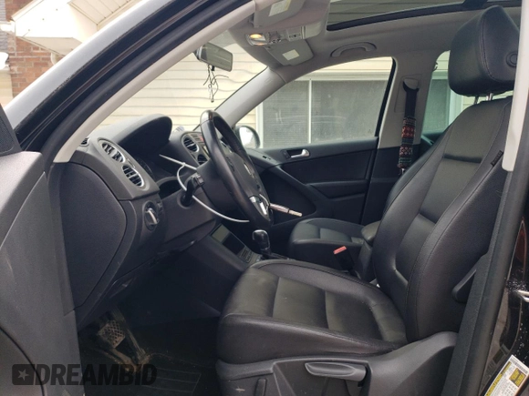 2011 Volkswagen Tiguan SEL with VIN WVGBV7AX4BW553986, listed as a Copart auction lot 43873765 with 140,097 mi miles and Salvage Title. Bid and sale history available at DreamBid. Image 7.