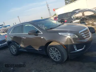 2019 Cadillac XT5 Luxury FWD z VIN 1GYKNCRS2KZ251207, wystawiony jako IAAI lot #42066271 z przebiegiem 128 226 mil mil oraz . Historia ofert i sprzedaży dostępna na DreamBid. Obrazek 13.