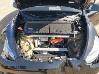 2025 Tesla Model Y Long Range with VIN 7SAYGDEEXSF267888, listed as a IAAI auction lot 41807129 with 3,002 mi miles and . Bid and sale history available at DreamBid. Image 10.
