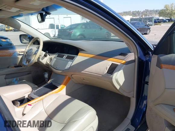 2005 Toyota Avalon XL with VIN 4T1BK36B55U054645, listed as a IAAI auction lot 42069828 with 184,789 mi miles and . Bid and sale history available at carsss.com. Image 5.