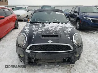 2013 MINI Roadster S z VIN WMWSY3C58DT566208, wystawiony jako Copart lot #41480595 z przebiegiem 119 265 mil mil oraz Szkody całkowita. Historia ofert i sprzedaży dostępna na DreamBid. Obrazek 5.
