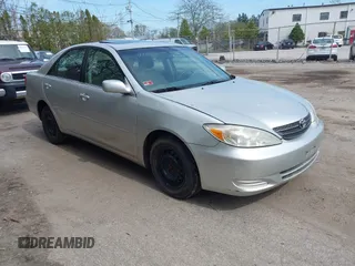 2002 Toyota Camry LE z VIN 4T1BE32K42U029129, wystawiony jako IAAI lot #42190162 z przebiegiem 191 423 mil mil oraz . Historia ofert i sprzedaży dostępna na DreamBid. Obrazek 1.