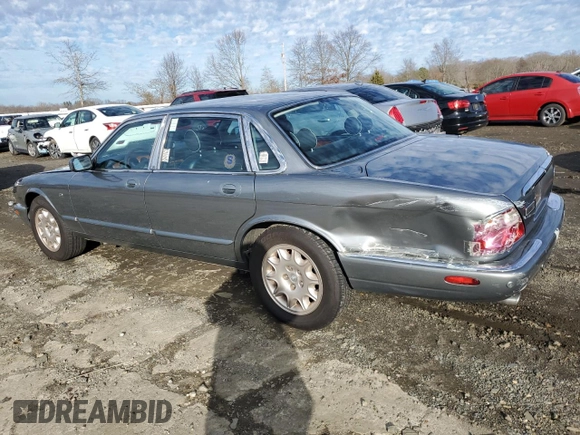 2003 Jaguar XJ 8 z VIN SAJDA14C83LF55424, wystawiony jako Copart lot #86324864 z przebiegiem 110 244 mil mil oraz Szkoda całkowita • Salvage title. Historia ofert i sprzedaży dostępna na DreamBid. Obrazek 2.