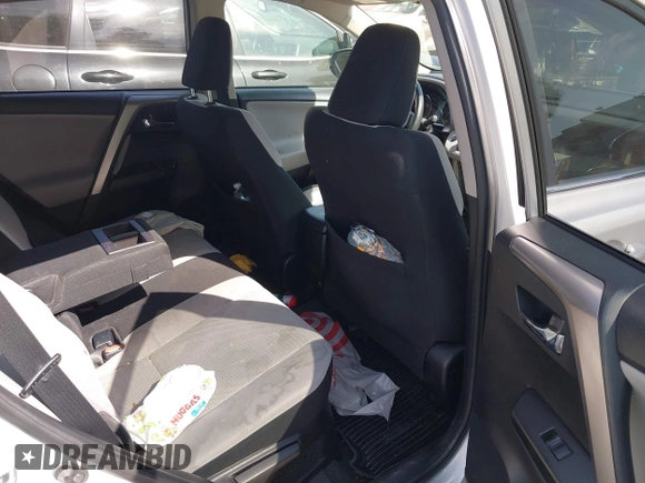 2016 Toyota RAV4 Hybrid XLE with VIN JTMRJREVXGD029019, listed as a IAAI auction lot 42021530 with 74,400 mi miles. Bid and sale history available at carsss.com. Image 8.