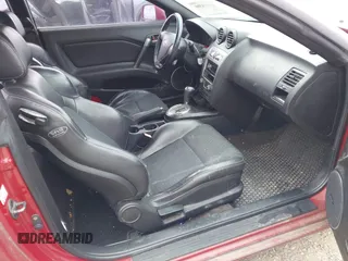 2007 Hyundai Tiburon GT z VIN KMHHN66F67U251509, wystawiony jako IAAI lot #42115300 z przebiegiem 180 334 mil mil oraz . Historia ofert i sprzedaży dostępna na DreamBid. Obrazek 5.