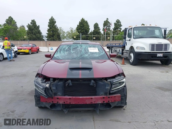 2019 Dodge Charger R/T with VIN 2C3CDXCT2KH749207, listed as a IAAI auction lot 42120658 with 52,330 mi miles and . Bid and sale history available at carsss.com. Image 12.