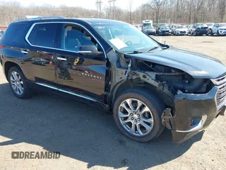 2018 Chevrolet Traverse Premier with VIN 1GNEVJKW8JJ159561, listed as a IAAI auction lot 41774914 with 132,598 mi miles and . Bid and sale history available at DreamBid. Image 1.