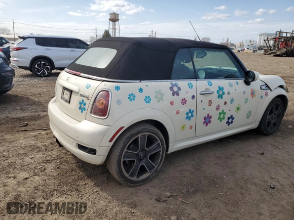 2010 MINI Convertible S with VIN WMWMS3C51ATZ85166, listed as a Copart auction lot 52907775 with 90,090 mi miles and Salvage title. Bid and sale history available at DreamBid. Image 3.