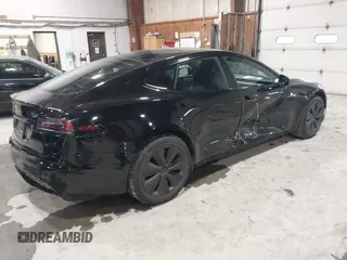 2022 Tesla Model S with VIN 5YJSA1E58NF478403, listed as a IAAI auction lot 41533099 with 42,779 mi miles and . Bid and sale history available at DreamBid. Image 4.