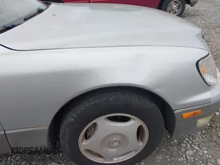 1999 Lexus LS 400 z VIN JT8BH28F1X0162721, wystawiony jako IAAI lot #42379655 z przebiegiem 316 746 mil mil oraz . Historia ofert i sprzedaży dostępna na DreamBid. Obrazek 6.