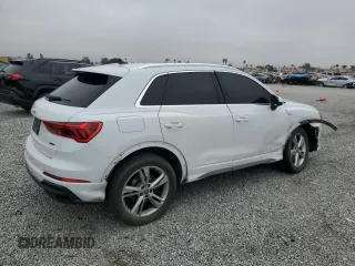2020 Audi Q3 S line Premium z VIN WA1DECF31L1122011, wystawiony jako Copart lot #50725195 z przebiegiem 47 567 mil mil oraz Szkody całkowita. Historia ofert i sprzedaży dostępna na DreamBid. Obrazek 3.