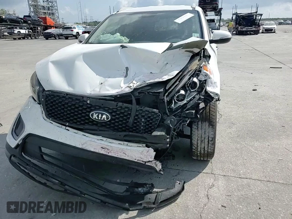 2017 Kia Sorento LX z VIN 5XYPG4A34HG220340, wystawiony jako Copart lot #57467775 z przebiegiem 144 612 mil mil oraz Szkoda całkowita • Salvage title. Historia ofert i sprzedaży dostępna na DreamBid. Obrazek 15.