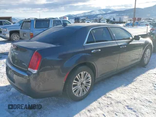 2017 Chrysler 300 with VIN 2C3CCAKG0HH541890, listed as a IAAI auction lot 41341803 with 127,610 mi miles. Bid and sale history available at carsss.com. Image 4.