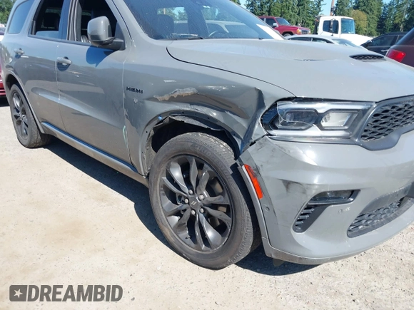 2022 Dodge Durango R/T with VIN 1C4SDJCT9NC230716, listed as a IAAI auction lot 42676407 with 21,791 mi miles and . Bid and sale history available at DreamBid. Image 18.