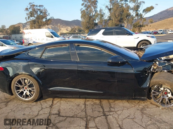 2022 Tesla Model S with VIN 5YJSA1E50NF462647, listed as a IAAI auction lot 41354668 with Not Provided miles and . Bid and sale history available at DreamBid. Image 12.