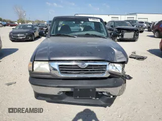 1999 Mazda B-Series 2WD Truck SX with VIN 4F4YR12C8XTM24080, listed as a Copart auction lot 77496454 with 113,302 mi miles and Salvage Title. Bid and sale history available at carsss.com. Image 5.