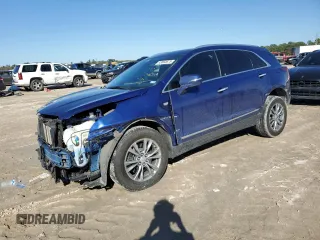 2023 Cadillac XT5 FWD Premium Luxury with VIN 1GYKNCRS3PZ154122, listed as a Copart auction lot 43063675 with 52,279 mi miles and Salvage Title. Bid and sale history available at carsss.com. Image 1.