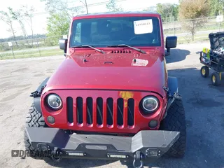 2011 Jeep Wrangler Unlimited Sport with VIN 1J4BA3H18BL598323, listed as a IAAI auction lot 41958043 with 154,354 mi miles. Bid and sale history available at carsss.com. Image 12.