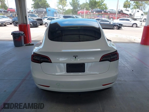2023 Tesla Model 3 z VIN 5YJ3E1EAXPF606178, wystawiony jako IAAI lot #42543528 z przebiegiem 26 638 mil mil oraz . Historia ofert i sprzedaży dostępna na DreamBid. Obrazek 16.