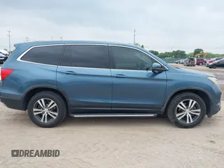 2017 Honda Pilot EX-L with VIN 5FNYF5H88HB042003, listed as a IAAI auction lot 42296542 with 172,823 mi miles and . Bid and sale history available at DreamBid. Image 13.