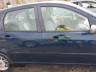 2004 Ford Focus ZX5 z VIN 3FAFP37334R120359, wystawiony jako IAAI lot #41922026 z przebiegiem 115 789 mil mil oraz . Historia ofert i sprzedaży dostępna na DreamBid. Obrazek 13.