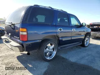 2002 Chevrolet Tahoe LS z VIN 1GNEC13T42R256432, wystawiony jako Copart lot #51706375 z przebiegiem 193 298 mil mil oraz Szkoda całkowita • Salvage title. Historia ofert i sprzedaży dostępna na DreamBid. Obrazek 3.