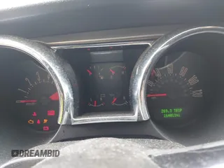 2005 Ford Mustang Deluxe z VIN 1ZVFT80N655234887, wystawiony jako IAAI lot #42521363 z przebiegiem 164 011 mil mil oraz . Historia ofert i sprzedaży dostępna na DreamBid. Obrazek 7.