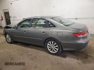 2007 Hyundai Azera SE z VIN KMHFC46FX7A183539, wystawiony jako Copart lot #54205265 z przebiegiem 154 942 mil mil oraz Nie do naprawy • Non repairable. Historia ofert i sprzedaży dostępna na DreamBid. Obrazek 2.