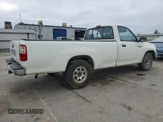 1997 Toyota T100 with VIN JT4JM11D9V0019752, listed as a Copart auction lot 82449524 with 279,981 mi miles and Salvage Title. Bid and sale history available at DreamBid. Image 3.