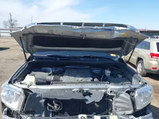 2014 Toyota Tundra 4WD Truck SR with VIN 5TFUW5F19EX330781, listed as a IAAI auction lot 41754261 with 168,388 mi miles. Bid and sale history available at carsss.com. Image 10.