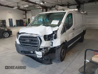 2020 Ford Transit Cargo with VIN 1FTBR1Y81LKA19650, listed as a IAAI auction lot 42727232 with 103,676 mi miles and . Bid and sale history available at DreamBid. Image 17.