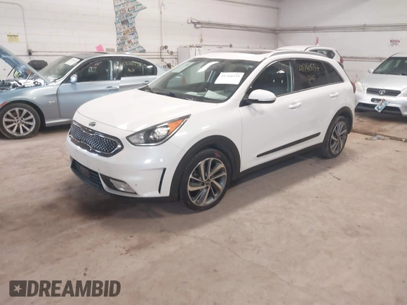 2019 Kia Niro Touring with VIN KNDCE3LC3K5216257, listed as a IAAI auction lot 41760534 with 117,187 mi miles. Bid and sale history available at carsss.com. Image 17.