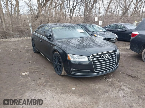 2015 Audi A8 L 4.0T with VIN WAU32AFD5FN026108, listed as a IAAI auction lot 41652860 with 148,253 mi miles. Bid and sale history available at carsss.com. Image 1.