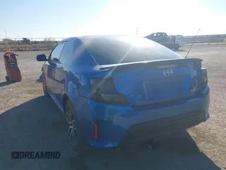 2014 Scion tC with VIN JTKJF5C78E3079618, listed as a IAAI auction lot 41107330 with 112,105 mi miles. Bid and sale history available at carsss.com. Image 3.