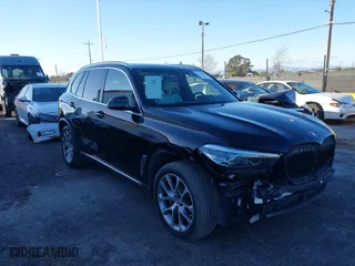 2023 BMW X5 sDrive40i with VIN 5UXCR4C06P9N83023, listed as a IAAI auction lot 41513687 with 42,211 mi miles. Bid and sale history available at carsss.com. Image 6.