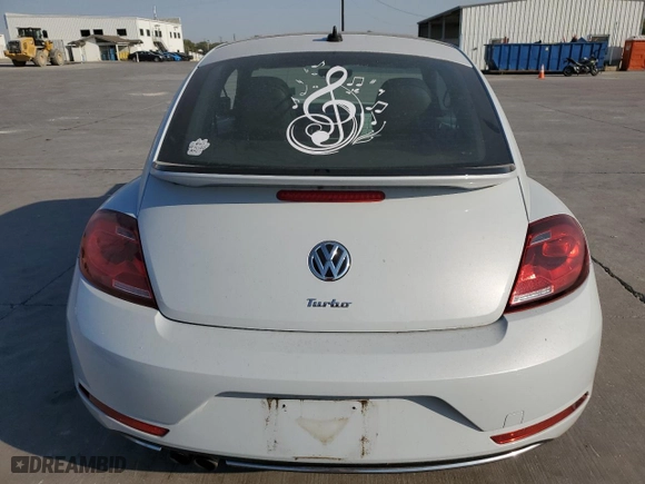 2018 Volkswagen Beetle SE with VIN 3VWJD7AT7JM701754, listed as a Copart auction lot 75018544 with 86,517 mi miles and Salvage Title. Bid and sale history available at carsss.com. Image 6.